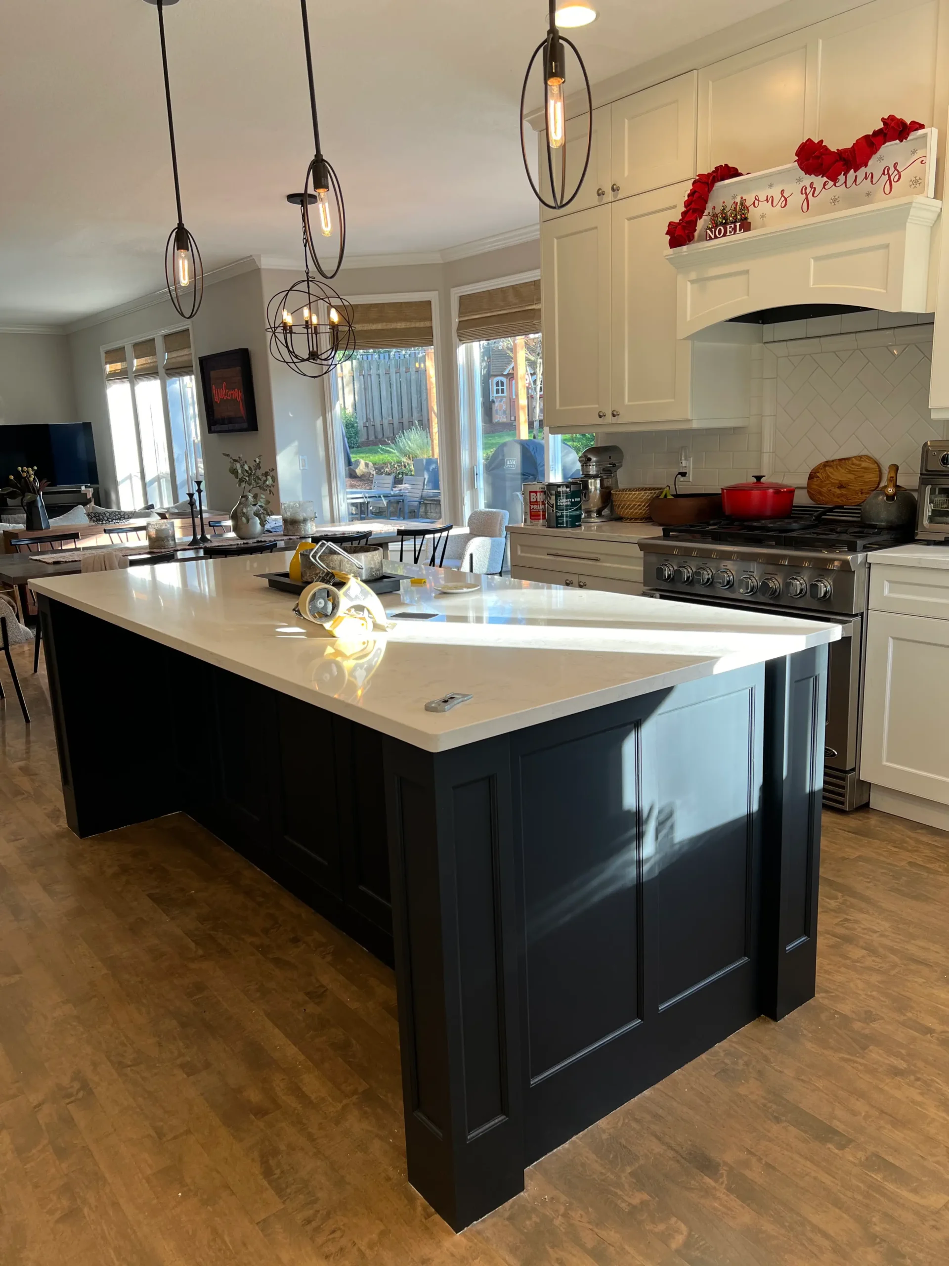Residential kitchen remodeling project featuring updated cabinetry and finishes